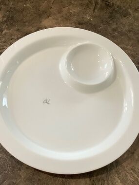 Serving platter with dip bowl built in